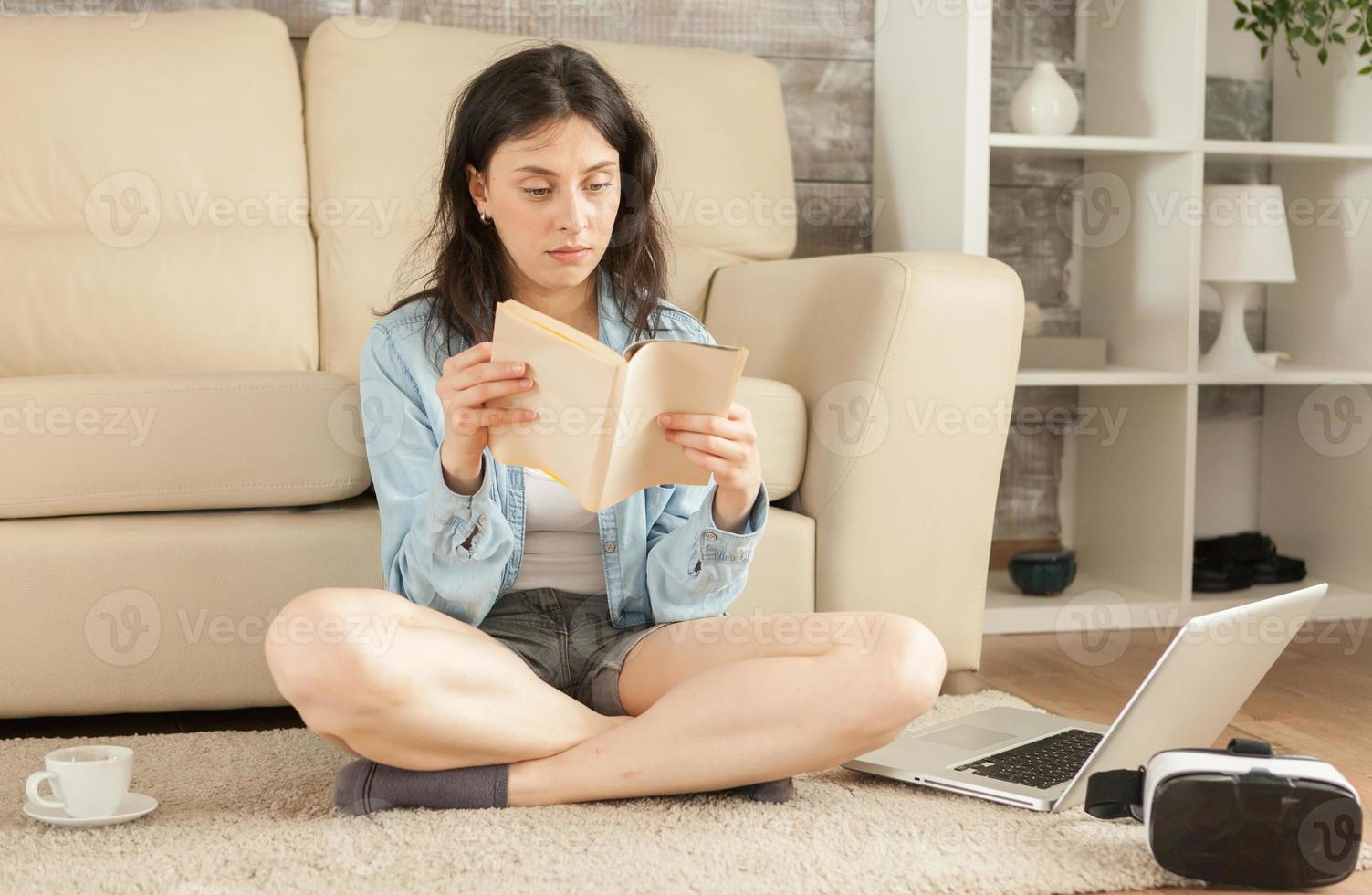 Happy woman reading a book photo