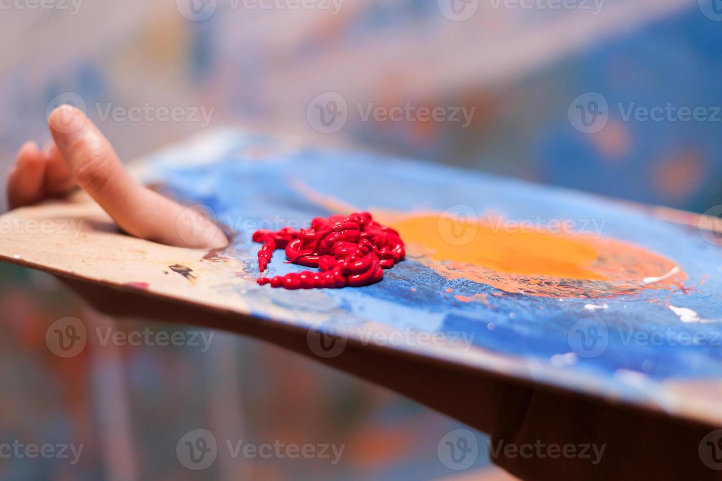 Red paint on palette photo