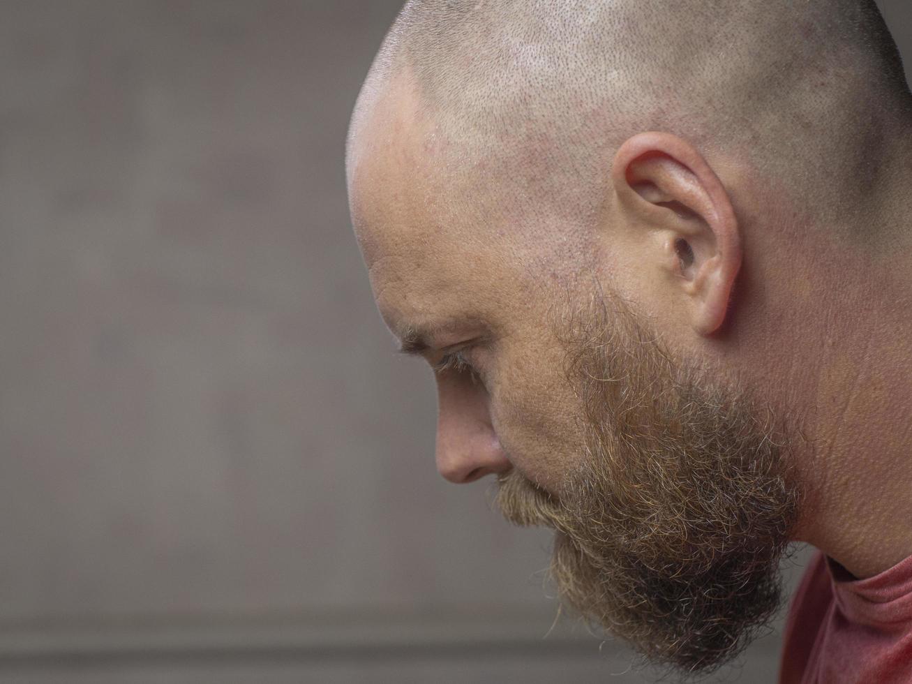 Portrait of a bald man with a beard photo