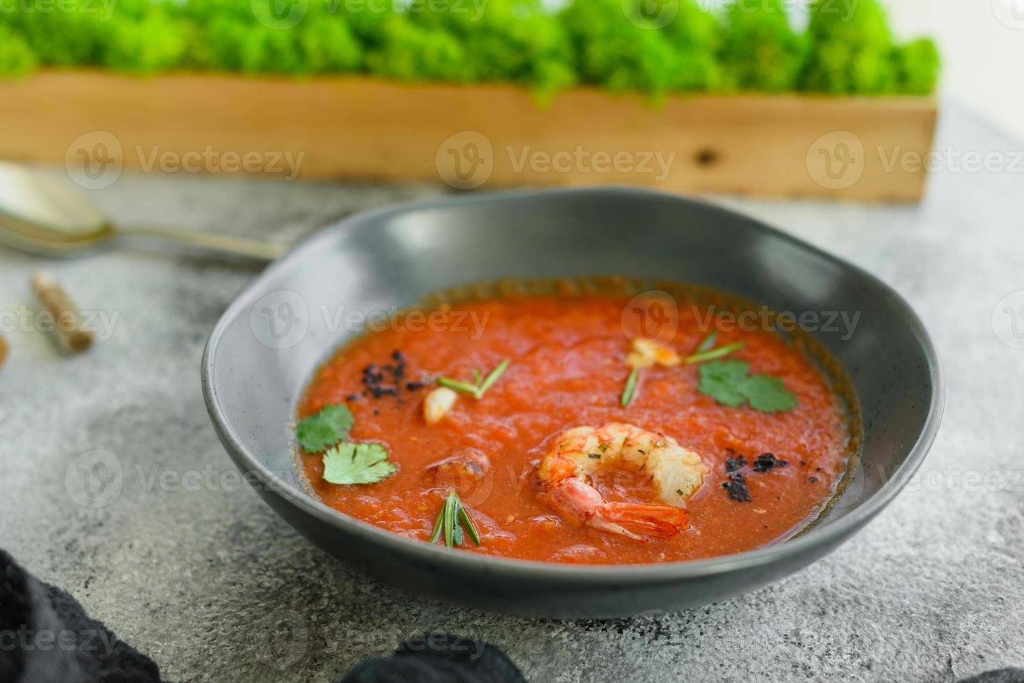 Close up of a spanish cold vegetable soup gazpacho photo