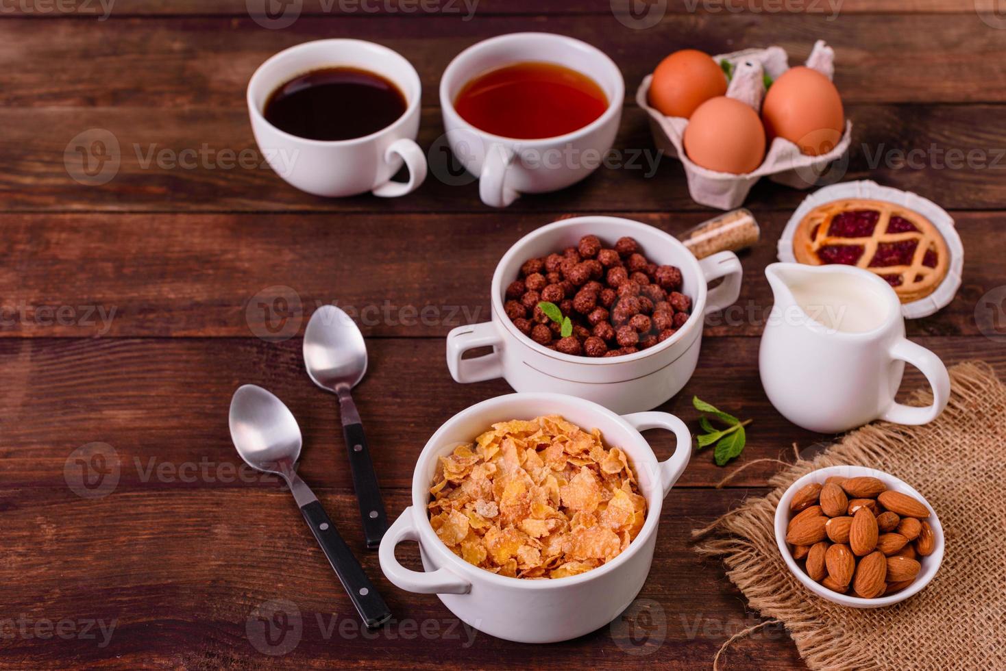 Tasty and nutritious breakfast with granola, cereals and nuts. Healthy food photo