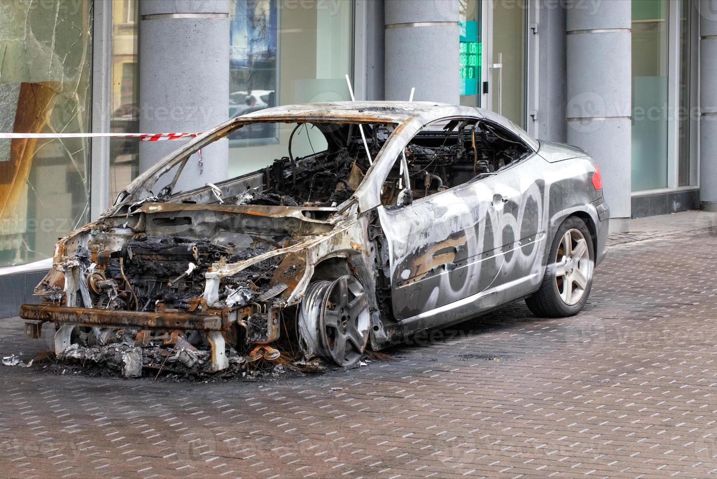 The interior of a burned-out car interior, side view. photo