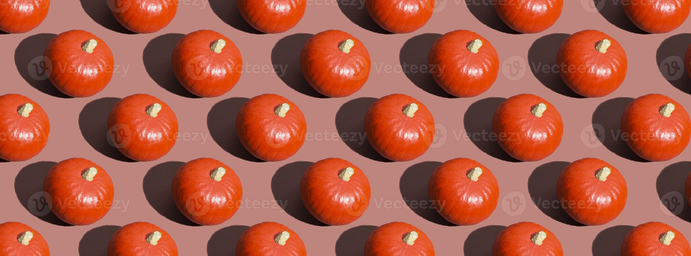 Pumpkin seamless pattern on a beige background. Thanksgiving Day. Autumn harvest. Copy space. Minimal concept. photo