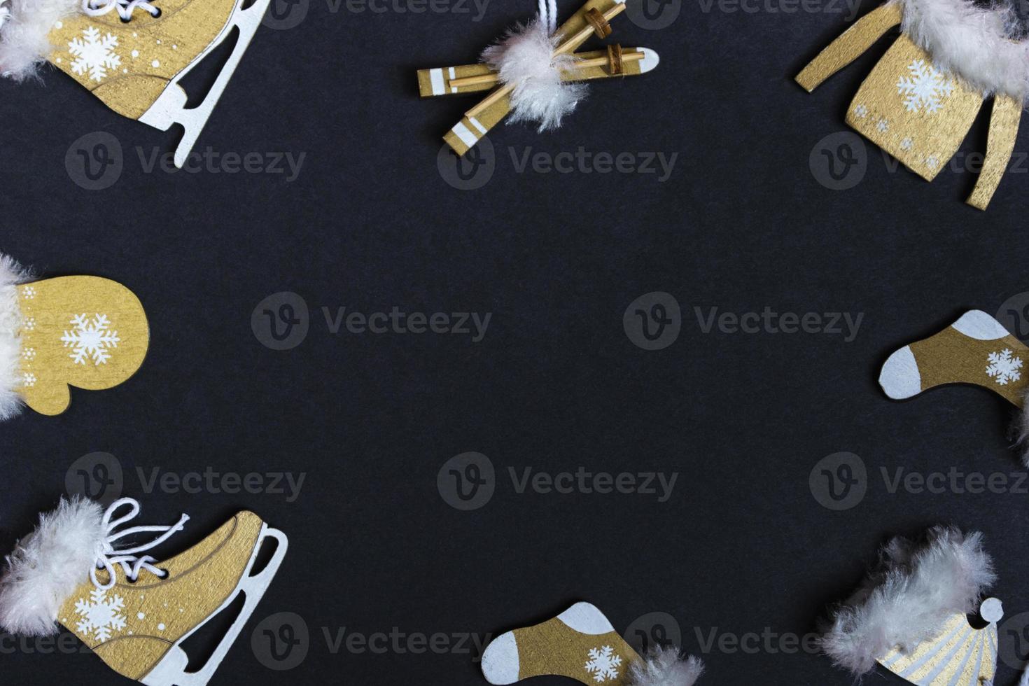 Top view flat New Year mockup on black background with numbers and New Year decor. New Year 2022, copy space photo