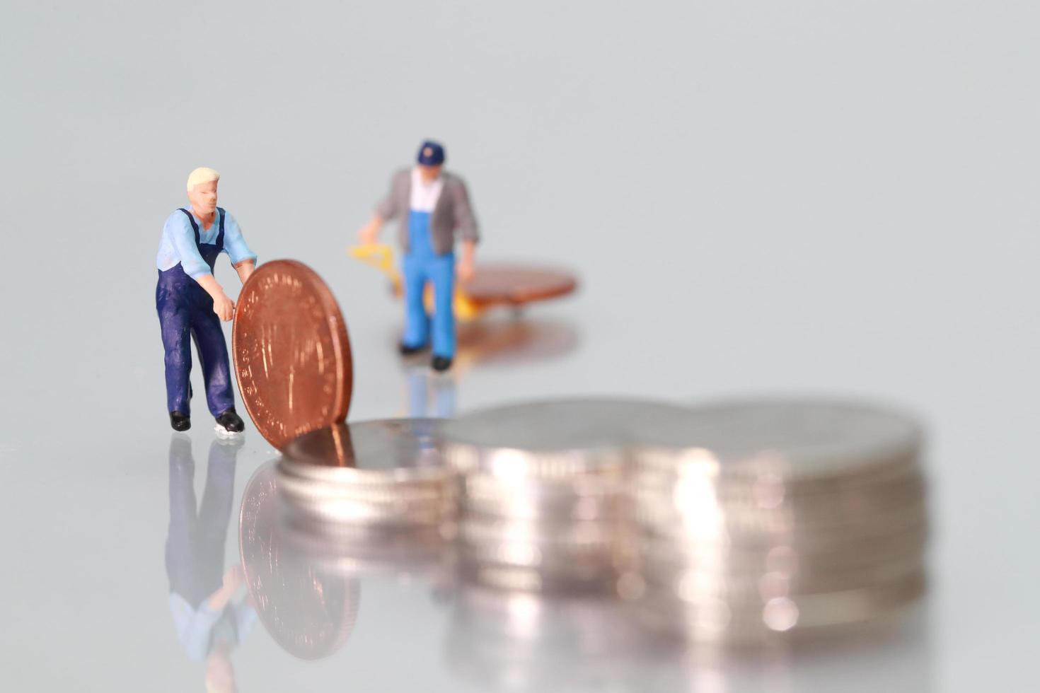 worker with coins, business concept using as background photo