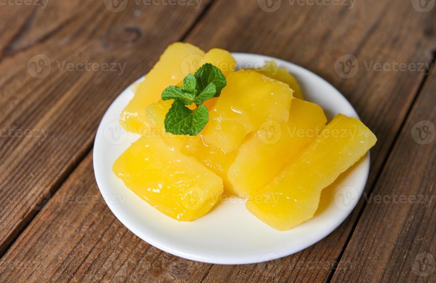 Boiled cassava root dessert with coconut milk Thai food or brazilian food cassava mandioca frita, Other name manihot esculenta, yuca, manioc, mandioca, Brazilian arrowroot photo