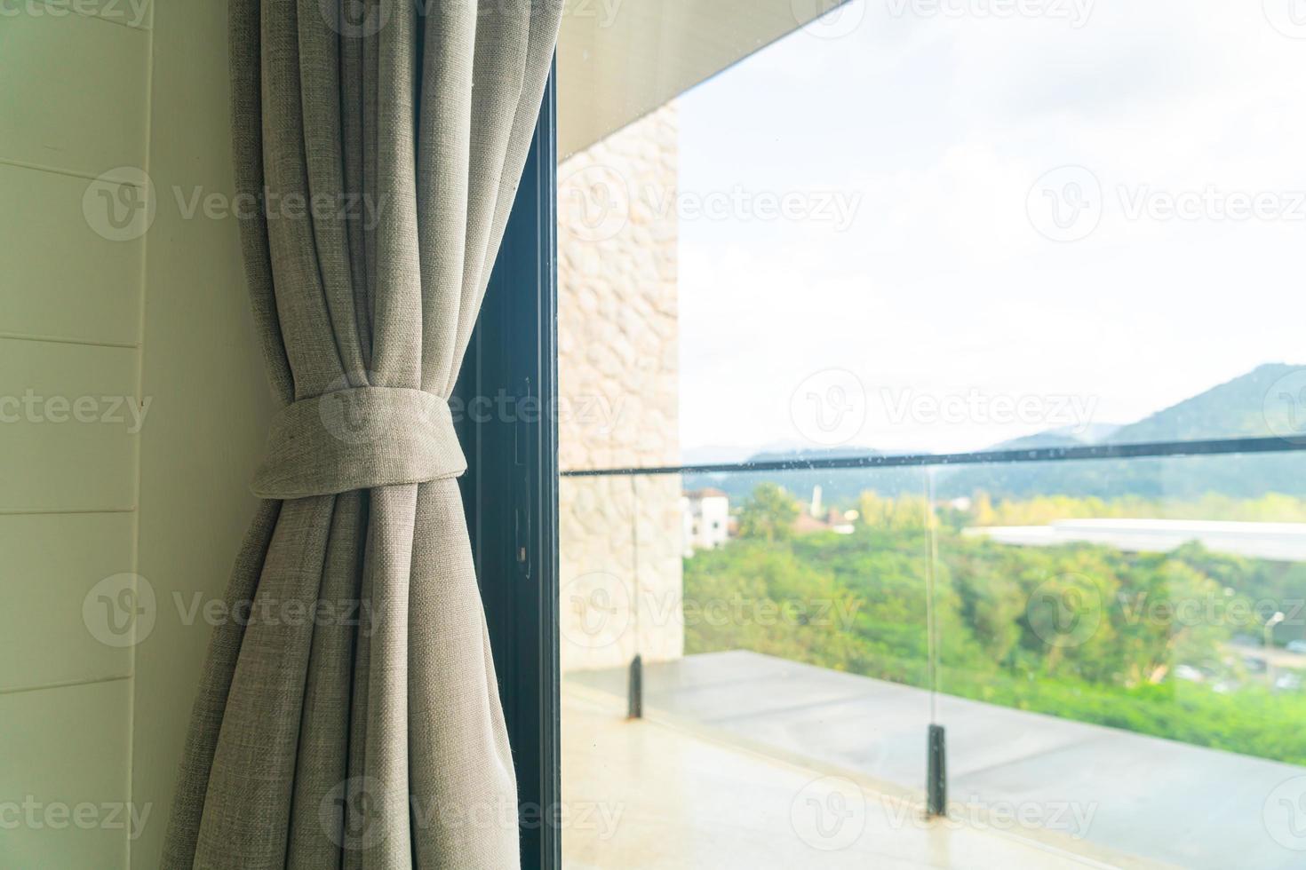 curtain with window and sunlight photo