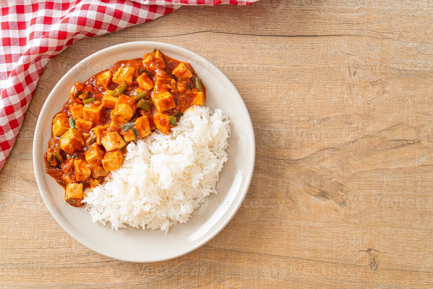 Mapo Tofu - The traditional Sichuan dish of silken tofu and ground beef, packed with mala flavor from chili oil and Sichuan peppercorns. photo