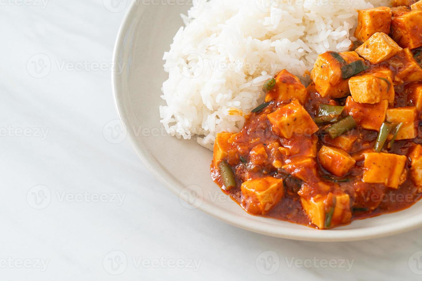 Mapo Tofu - The traditional Sichuan dish of silken tofu and ground beef, packed with mala flavor from chili oil and Sichuan peppercorns. photo