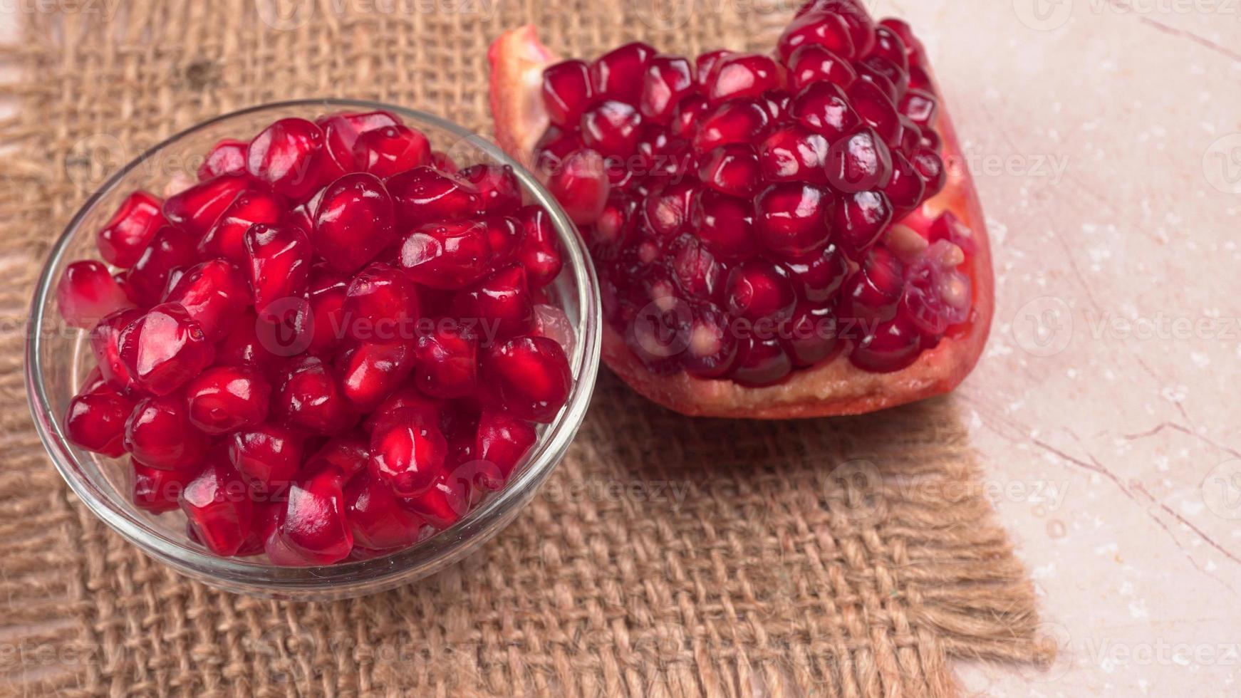 Fresh Pomegranate. rich in natural antioxidants. concept of red fruits, vitamins and natural antioxidants to the skin for beauty. photo