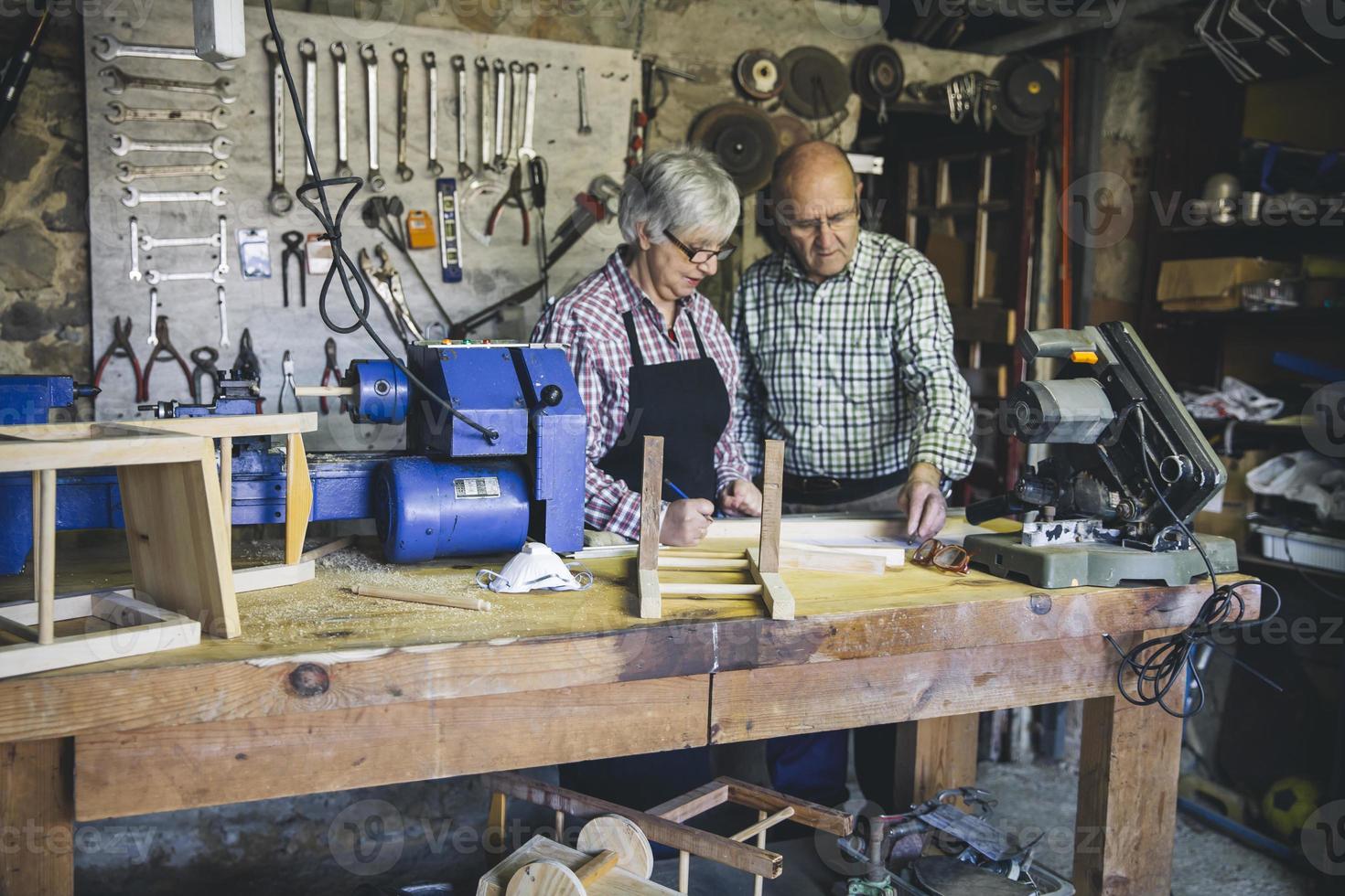 Senior couple in a carpentry photo