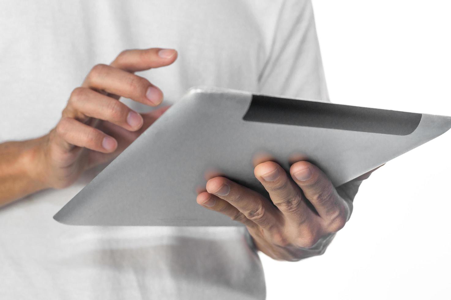 Hand using tablet  touching on screen technology photo