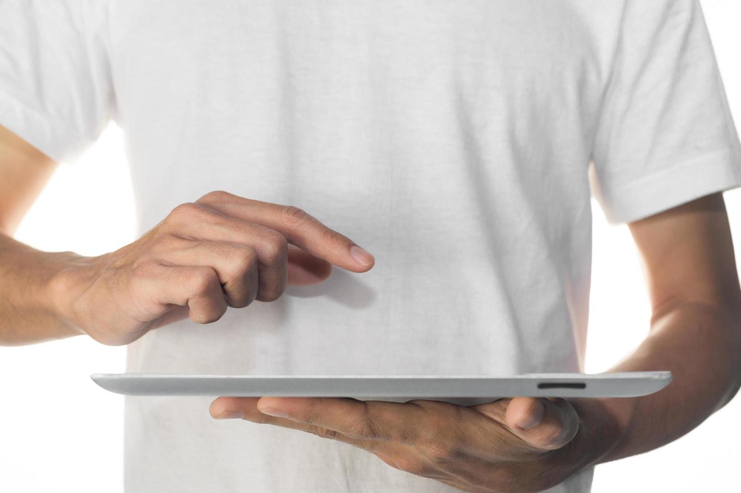 Hand using tablet  touching on screen technology photo