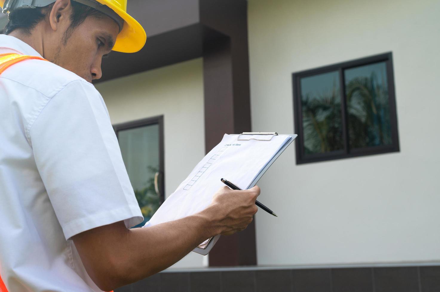 Engineer service on site inspection at home building construction photo