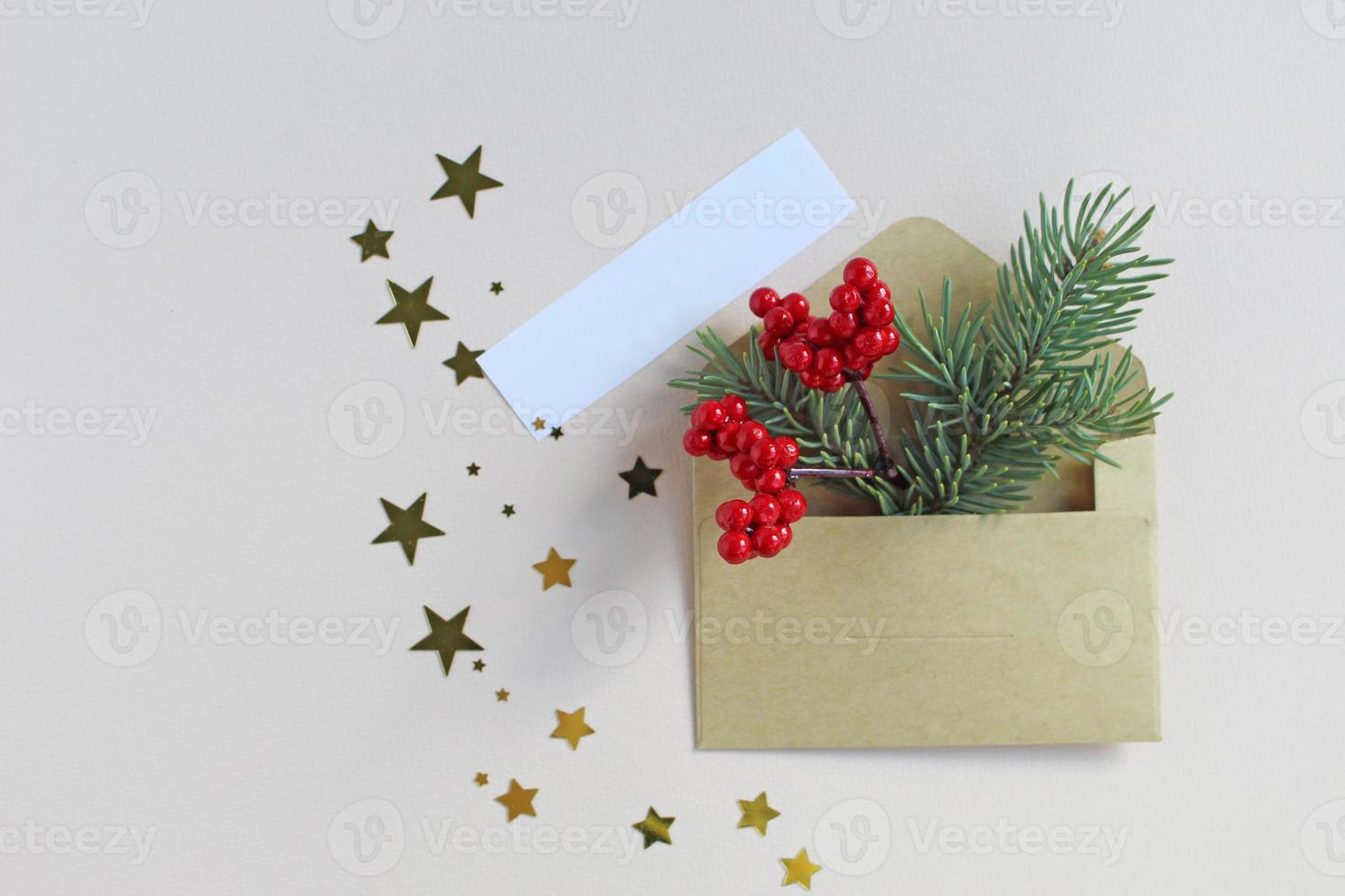 New Year or Christmas top view holiday celebration red envelope letter copy space green color paper background. Template greeting card photo