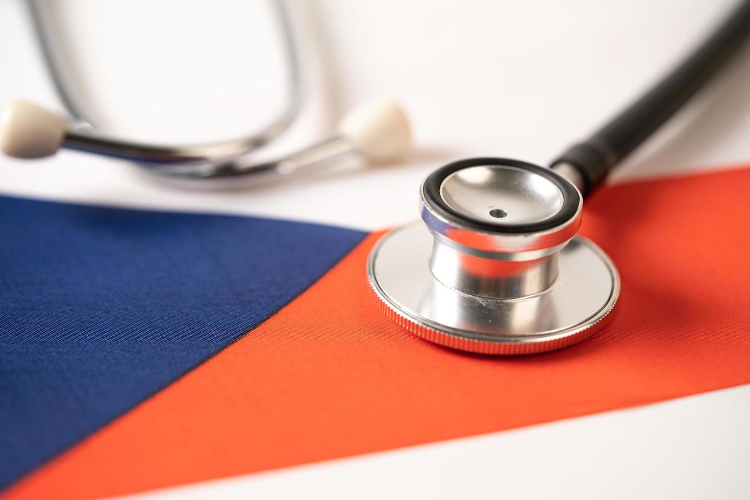 Black stethoscope on czech republic flag background, Business and finance concept. photo