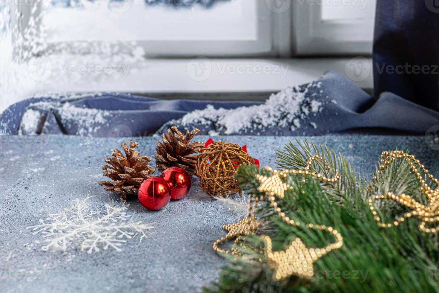 Christmas and New Year. Festive background with fir branches, Christmas tree, New Year's toys. View from above. photo