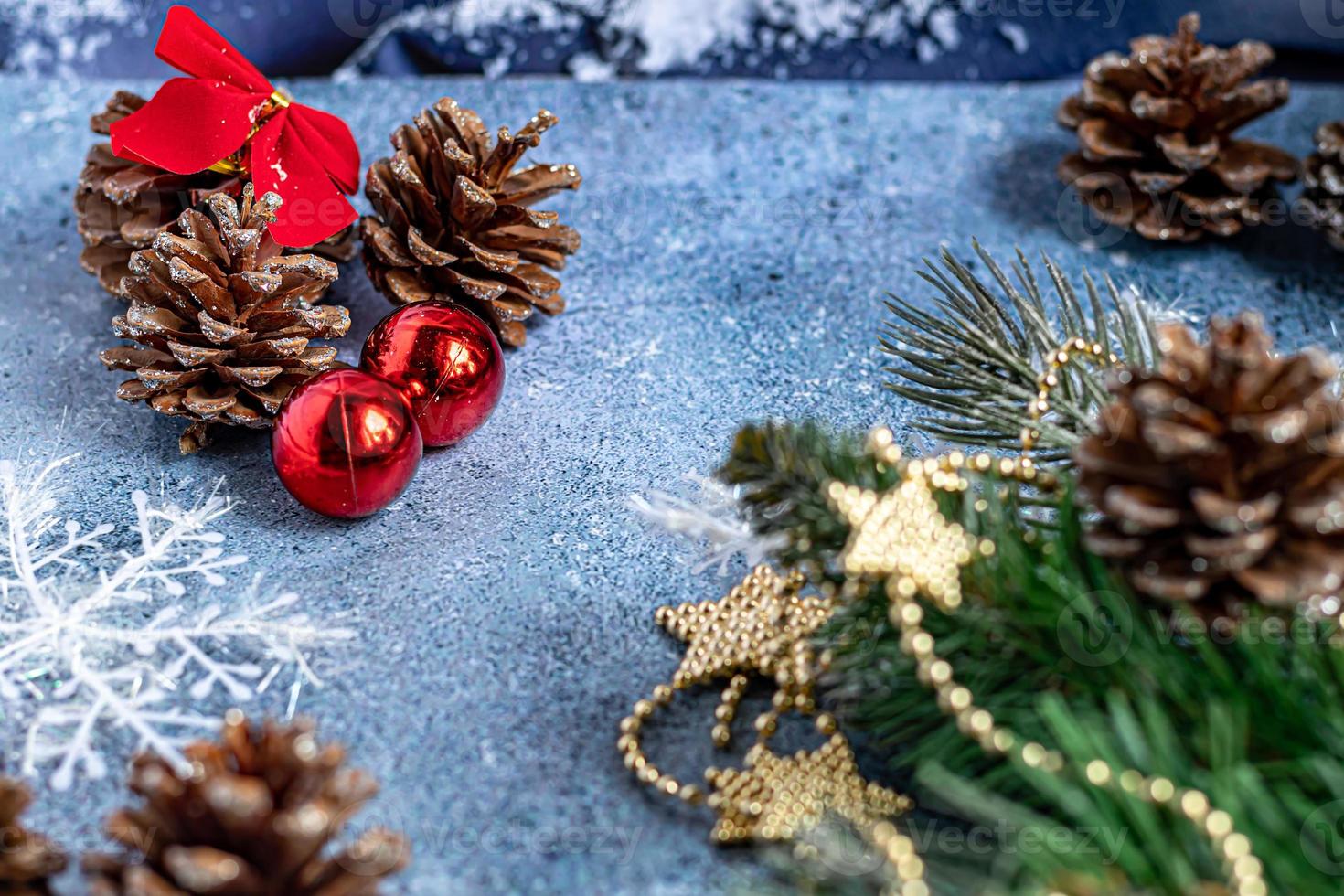 Christmas and New Year. Festive background with fir branches, Christmas tree, New Year's toys. View from above. photo