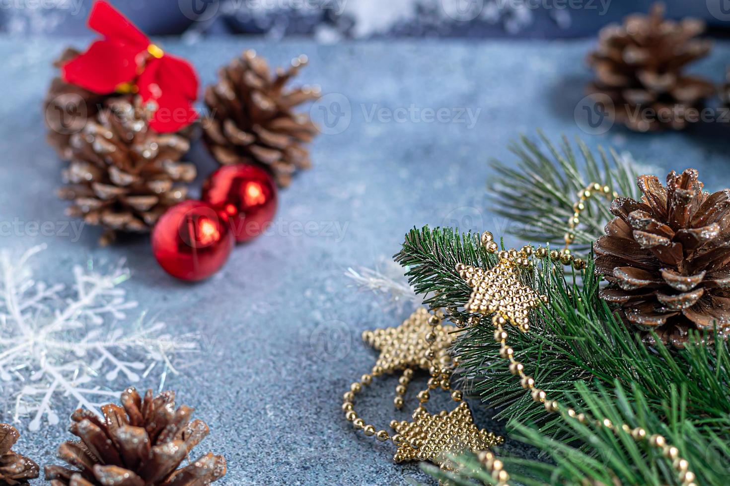 Christmas and New Year. Festive background with fir branches, Christmas tree, New Year's toys. View from above. photo