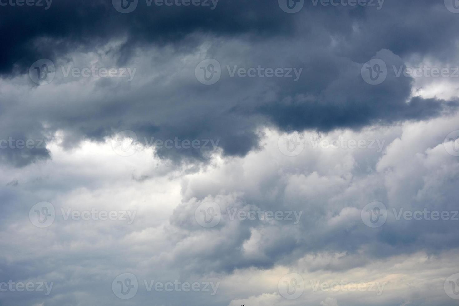 Cirrus clouds of the night sky. Thunderclouds. photo