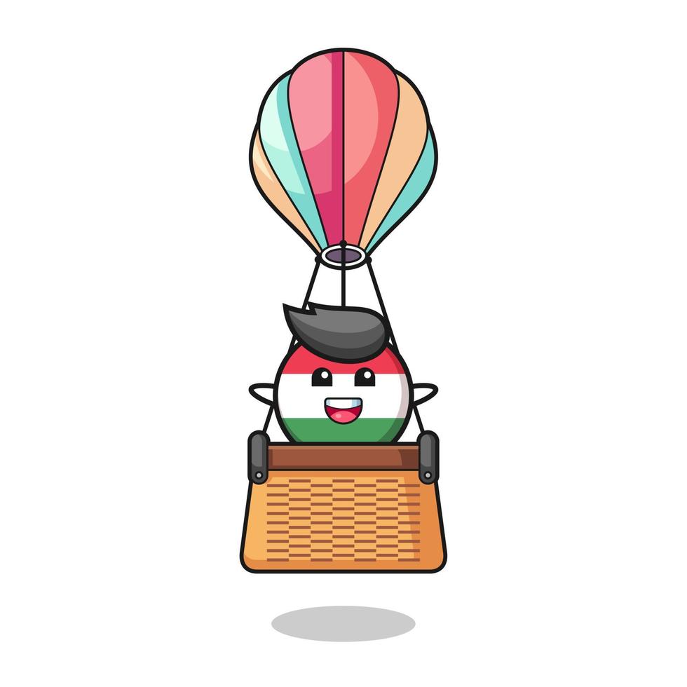 mascota de la bandera de hungría montando un globo aerostático vector