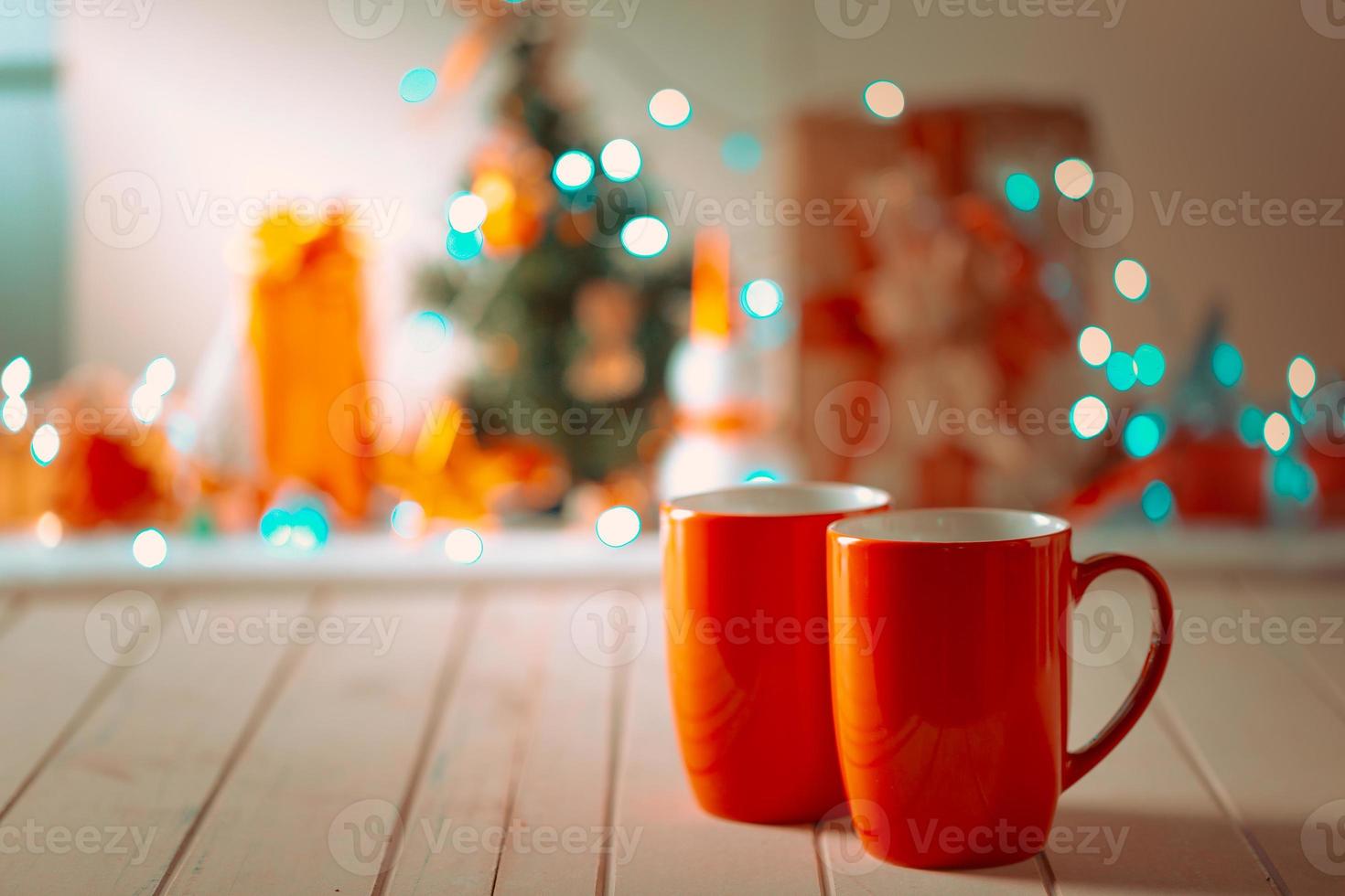 Couple red mugs on Christmas photo