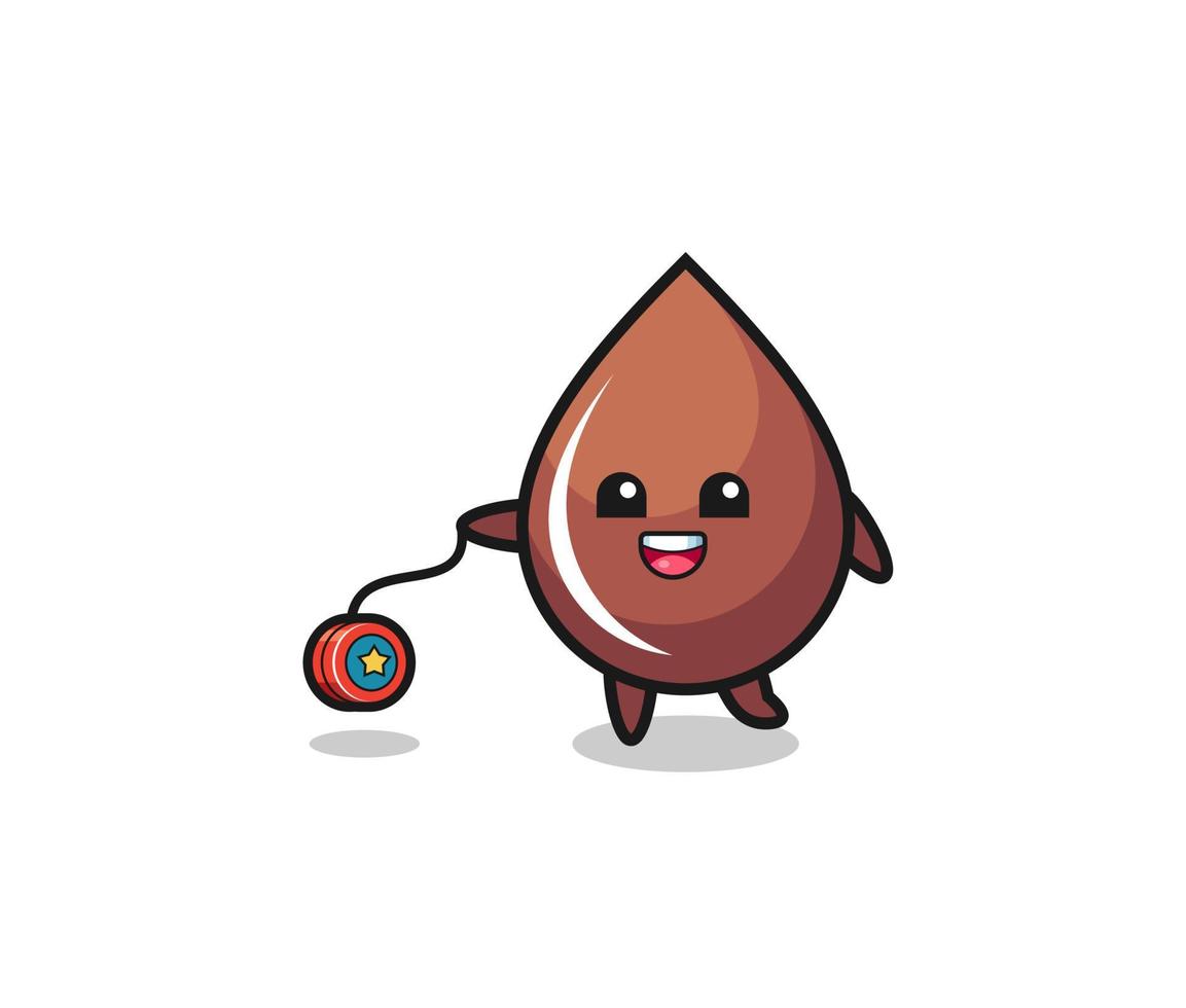 cartoon of cute chocolate drop playing a yoyo vector