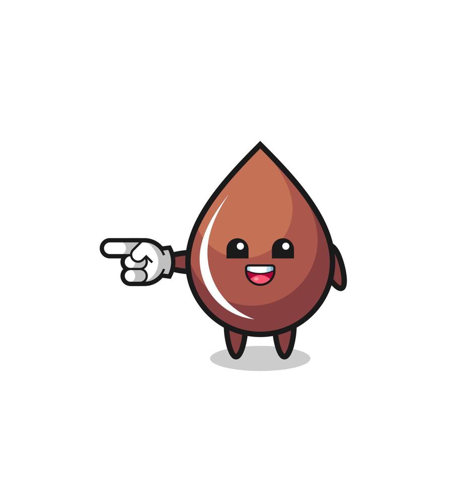 chocolate drop cartoon with pointing left gesture vector