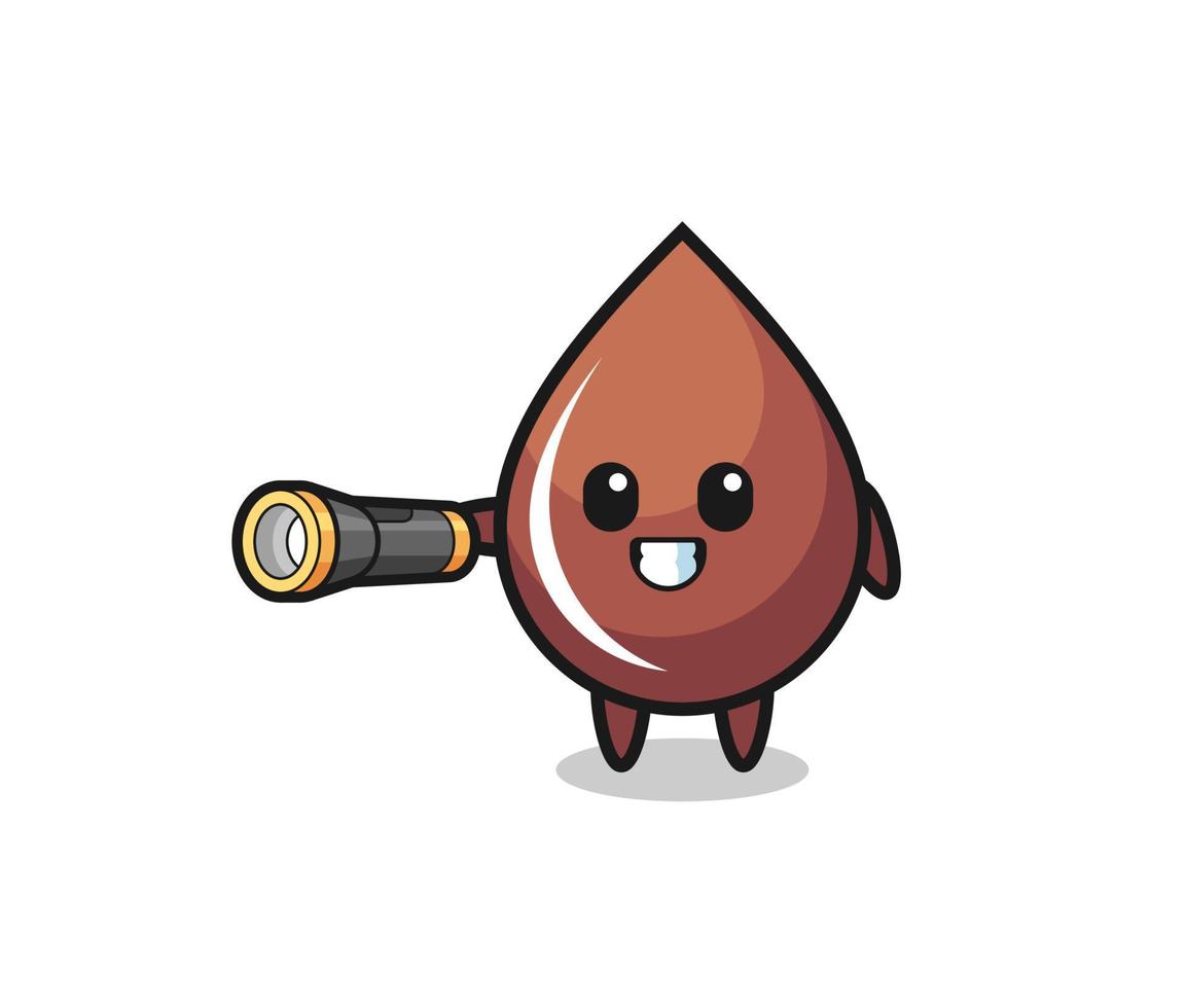 chocolate drop mascot holding flashlight vector