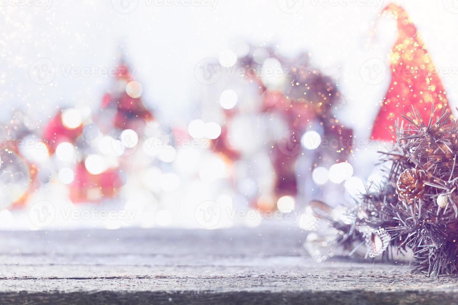 Wooden table and christmas lights background photo