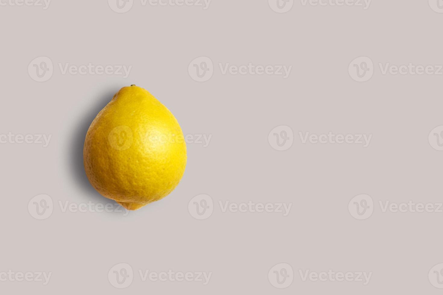 Fresh yellow lemon on a white background for the menu. Geometric background. Flat lay, copy space, top view. photo