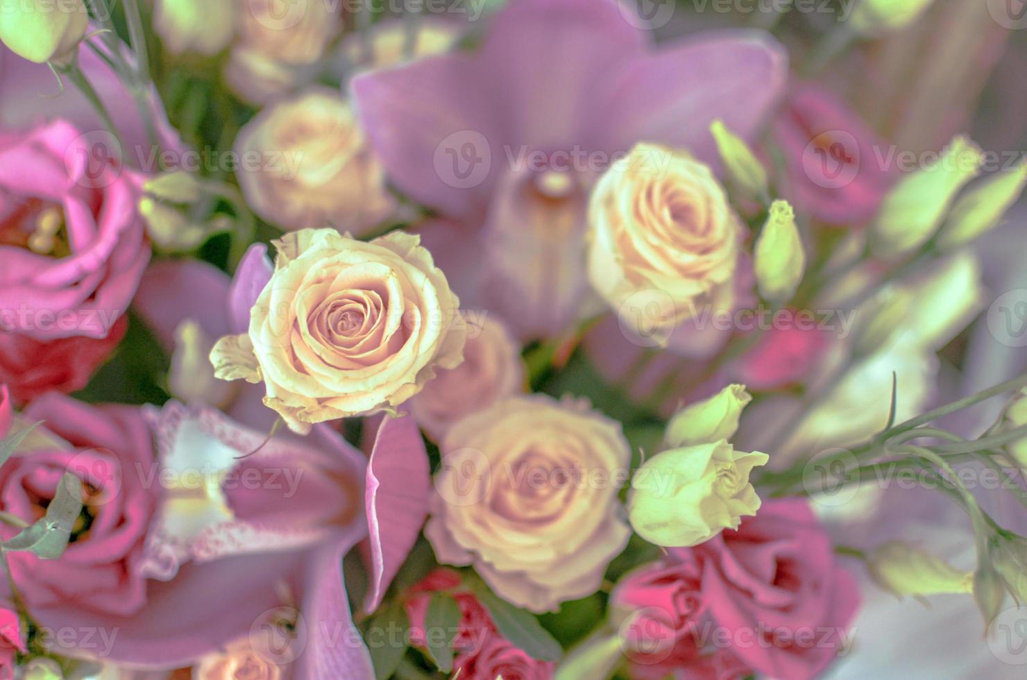 Bouquet with orchids and roses on a beautiful background photo