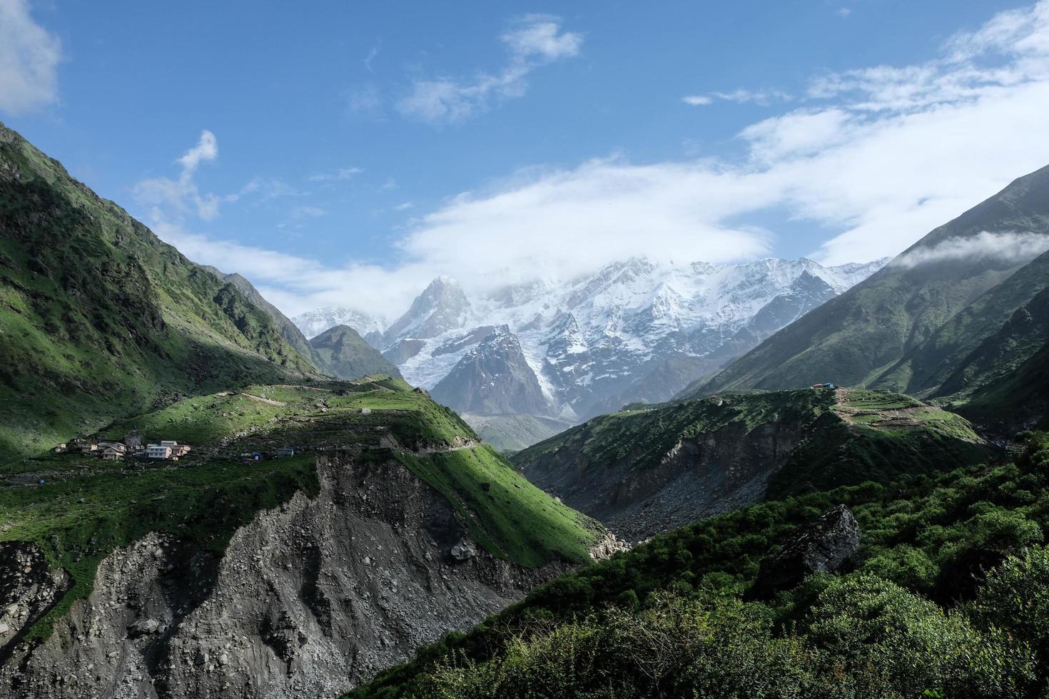 Lush Greenery Covered Mountainside of Himalayas and Springs of Glacial Water. photo