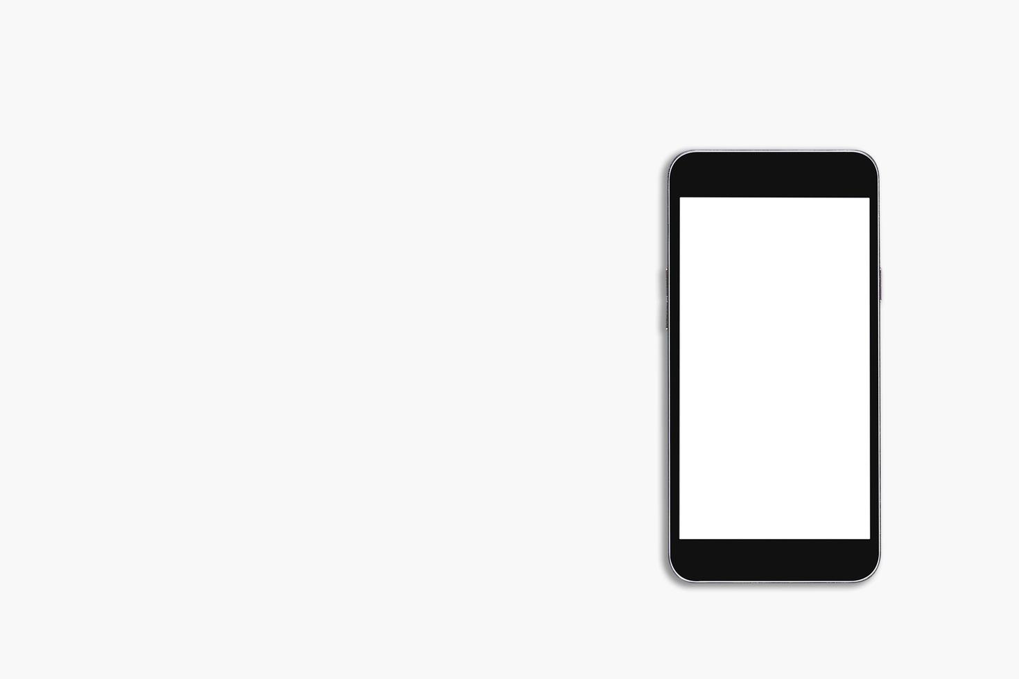 Black mobile phone blank screen white mockup smartphone on top view flat lay and copy space. For using your concept photo