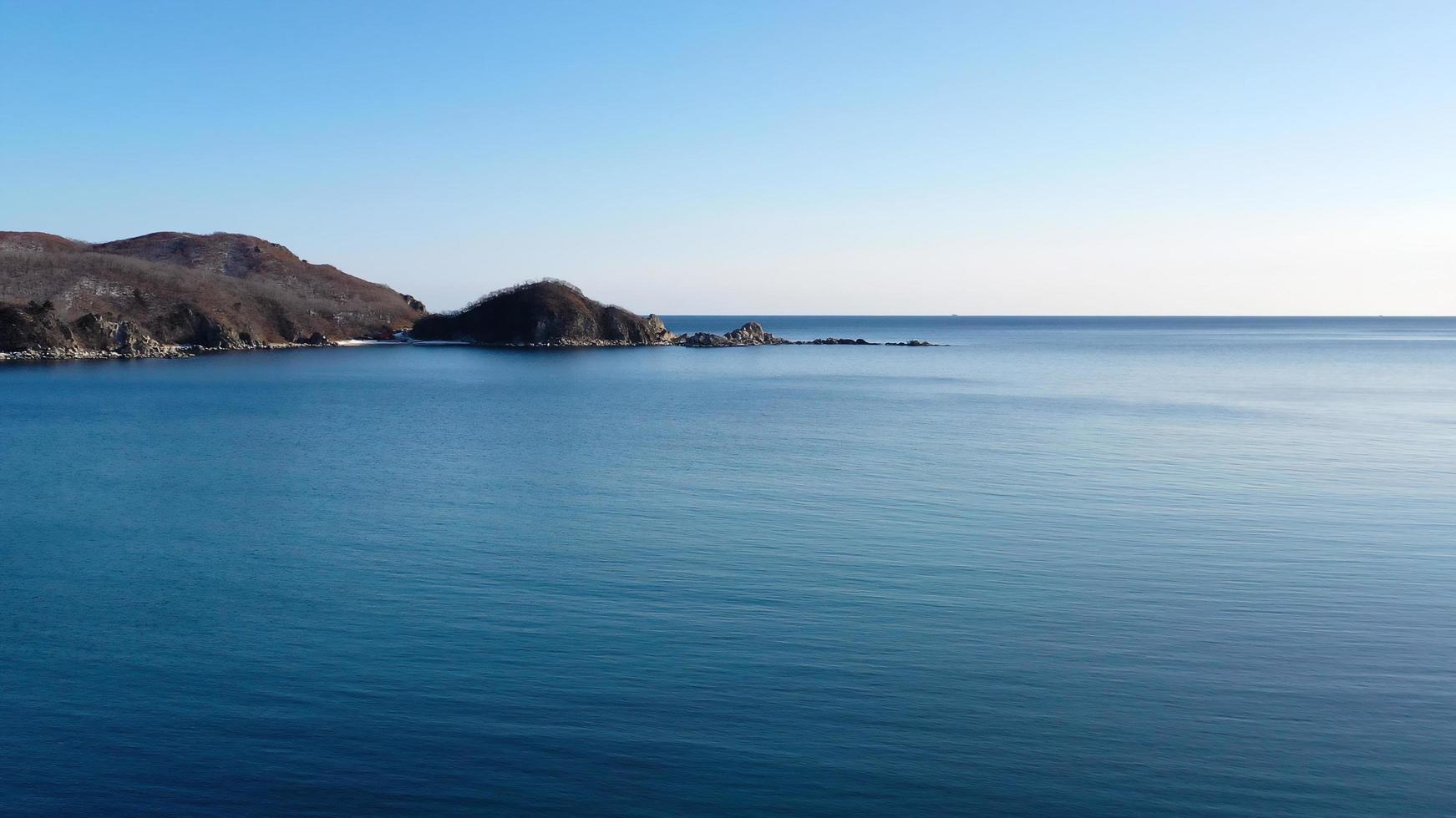 Seascape with a view of the coastline photo