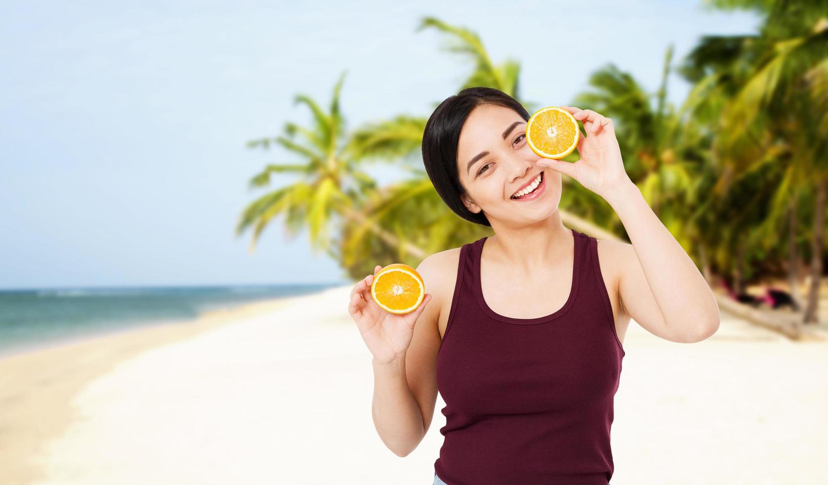 Luxury travel vacation happy asian woman looking at camera.Amazing view of sea and tropical,copy space photo