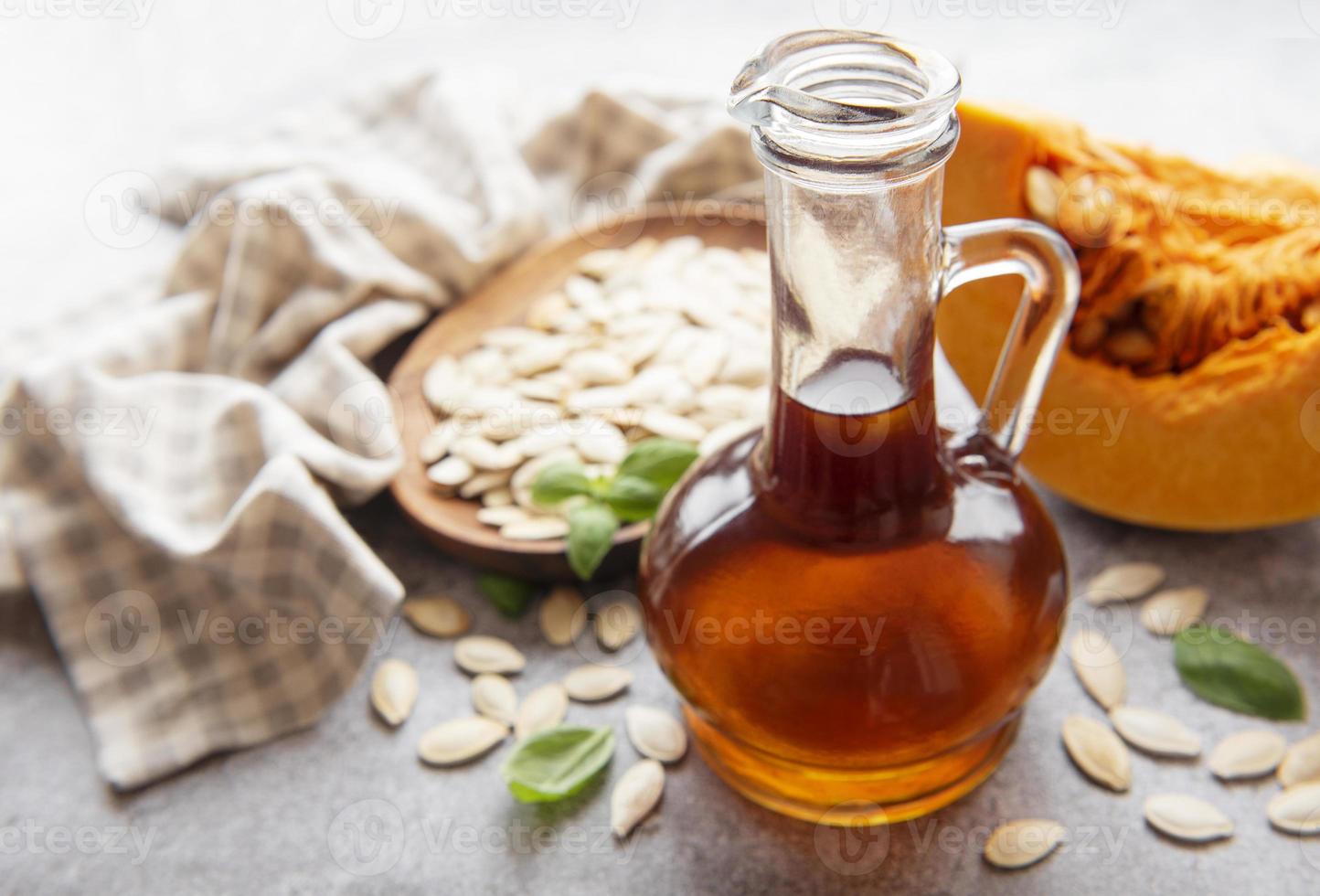 Bottle with pumpkin seed oil photo