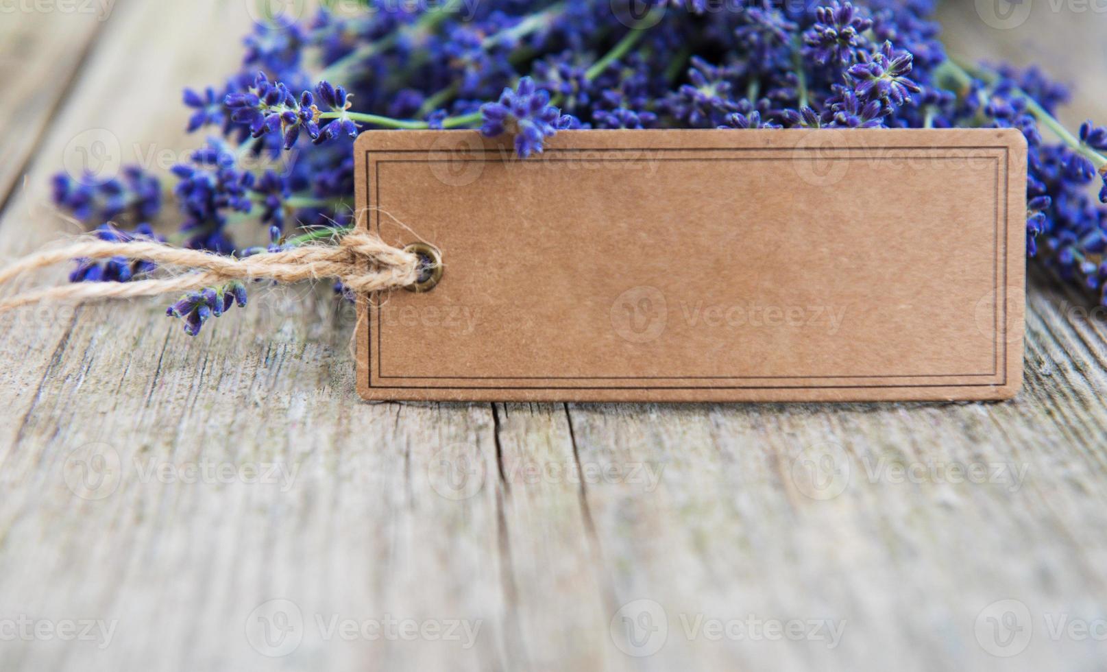 Empty tag and lavender flowers photo