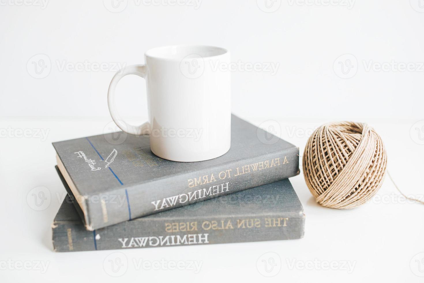 white coffee mug on gray table for mock-up set isolated glassy tankard design on white photo