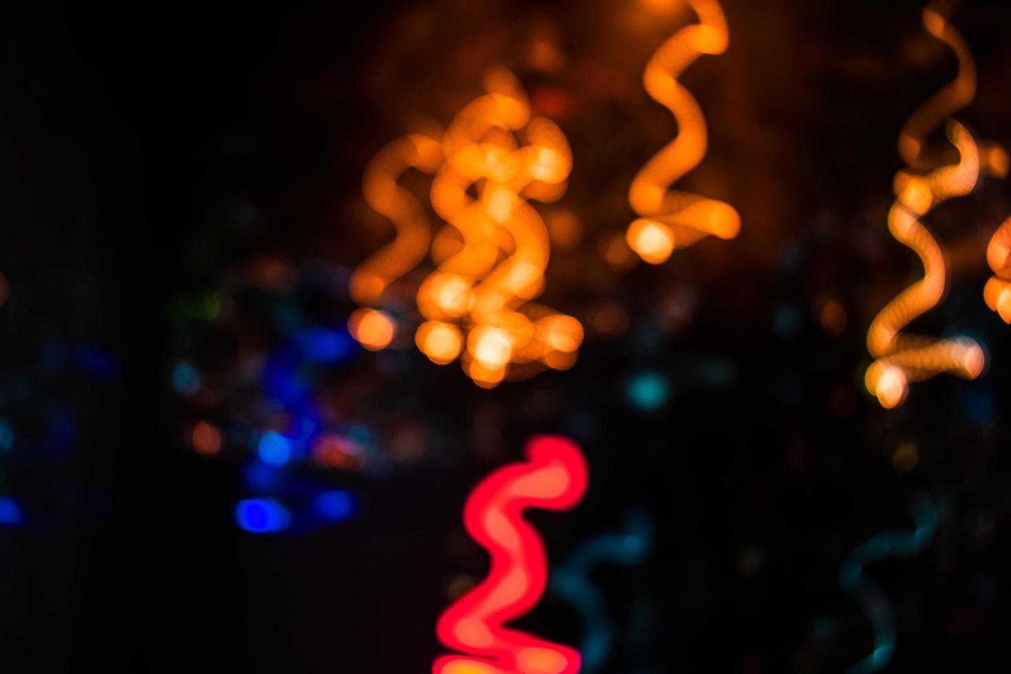 orange and blue light trail blur abstract lights at motion exposure time swirl trail effect photo