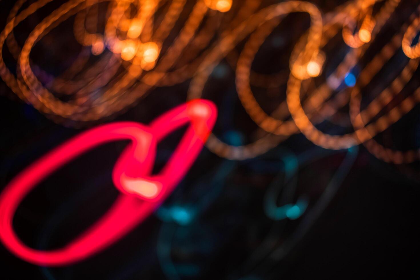 orange and blue light trail blur abstract lights at motion exposure time swirl trail effect photo