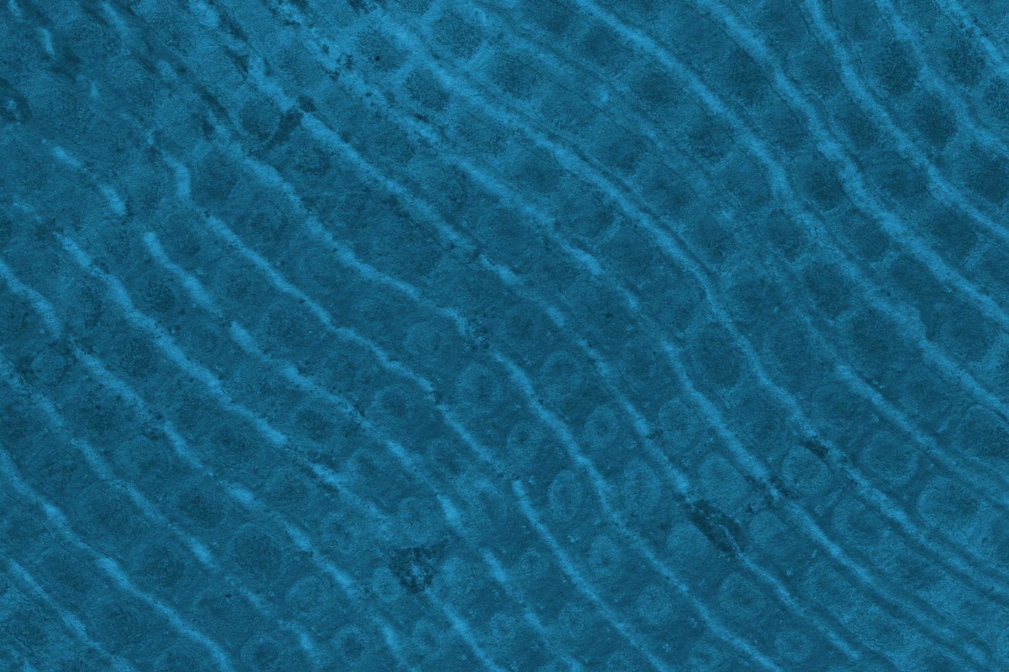 Textura de cielo y nube de mármol fluido suave azul oscuro acuarela abstracta con patrón líquido de tinción pastel. foto