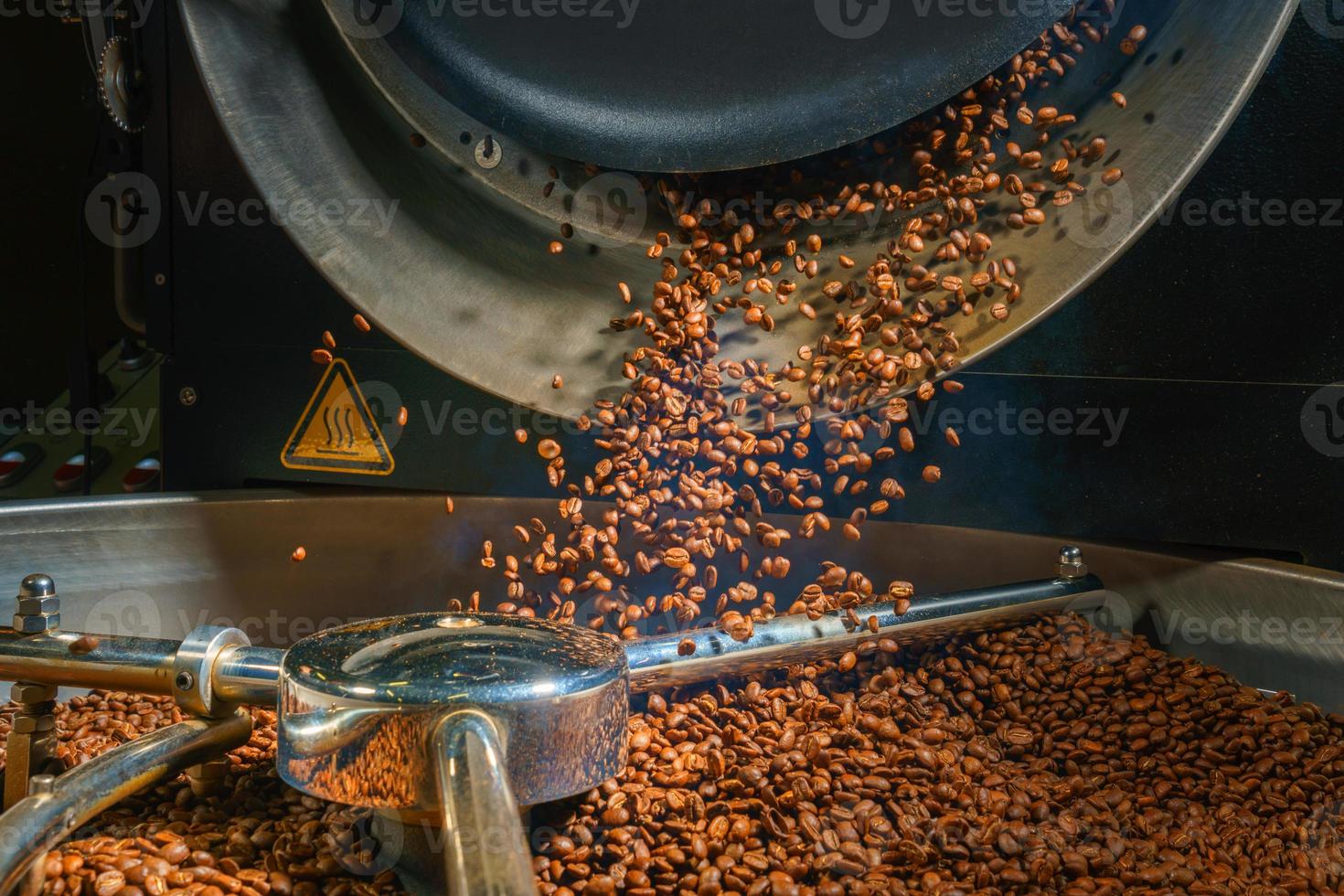 coffee bean roasted in a machine with motion blur photo