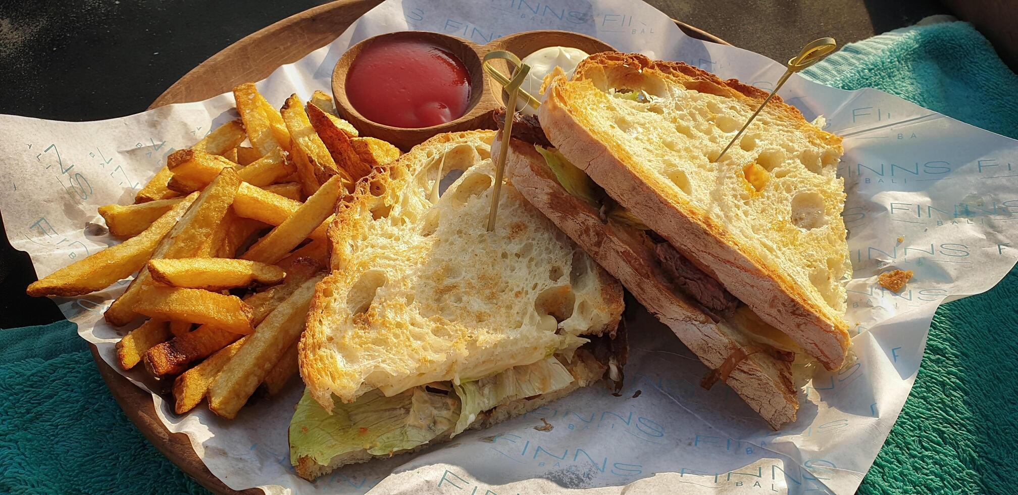 bread with french fries and sauce photo