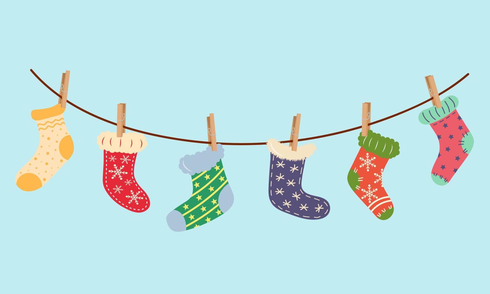 Christmas socks hanging on laundry string with clothespins