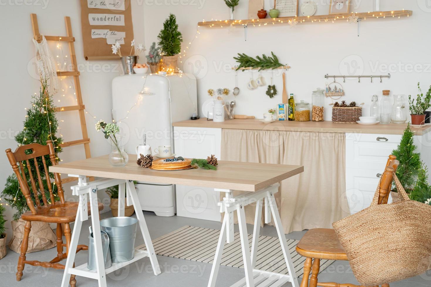beautiful cozy kitchen decorated for Christmas photo