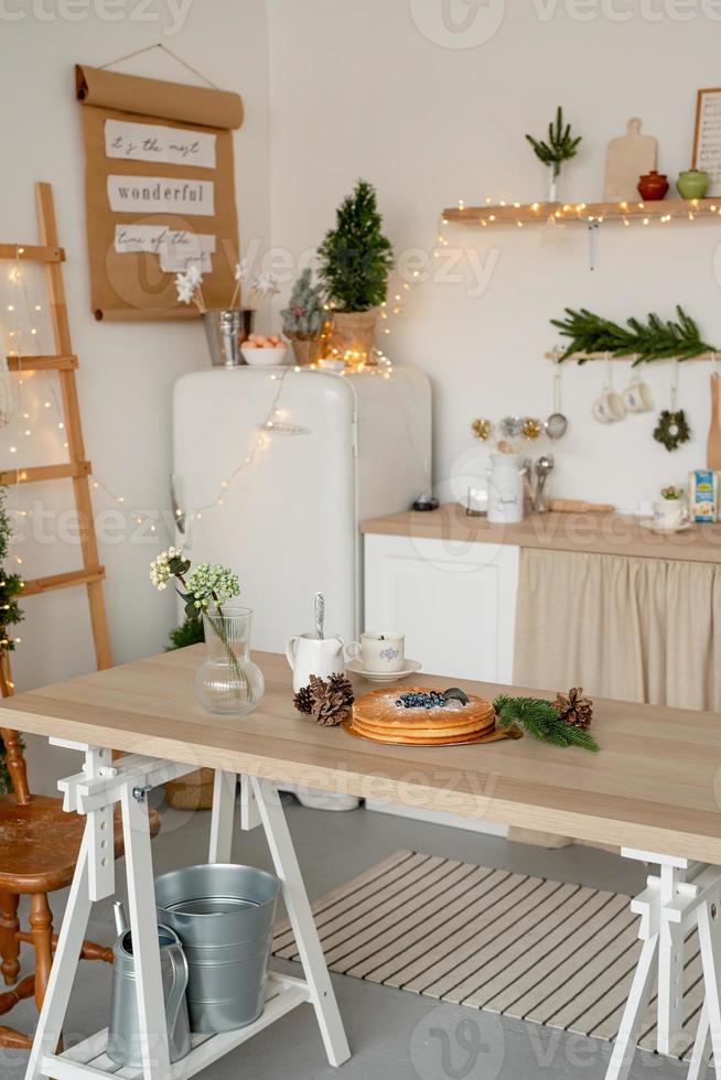beautiful cozy kitchen decorated for Christmas photo