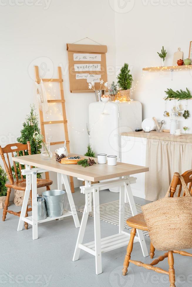 beautiful cozy kitchen decorated for Christmas photo