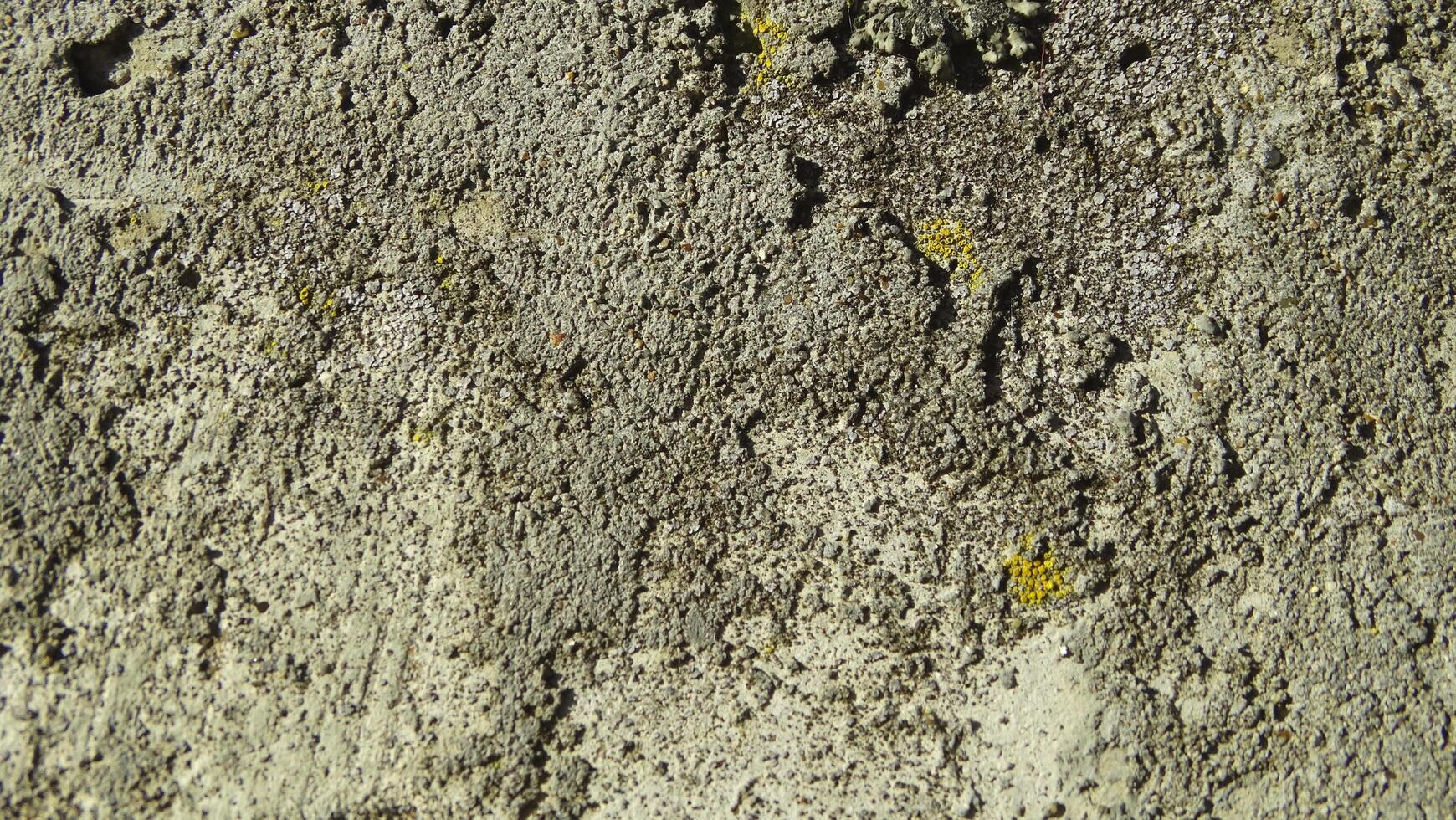 Textura realista de piedra gris abstracta con patrón de naturaleza de roca en la naturaleza. foto