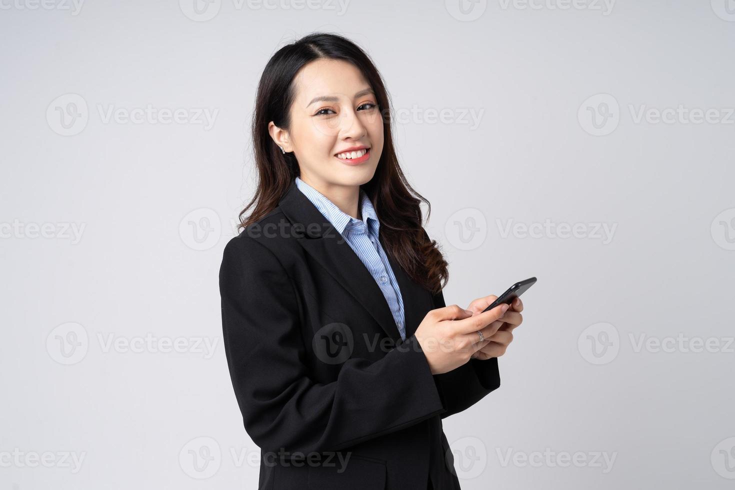 Asian businesswoman portrait, isolated on white background photo